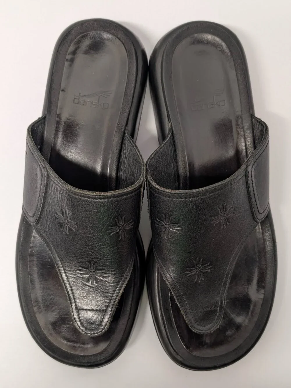 Dansko Floral Embossed Thong Sandals in Black Leather